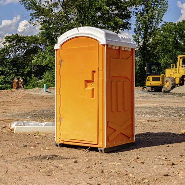 what is the cost difference between standard and deluxe portable toilet rentals in Brownsdale